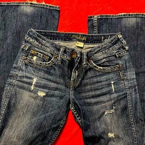 Silver Lola distressed flare jeans